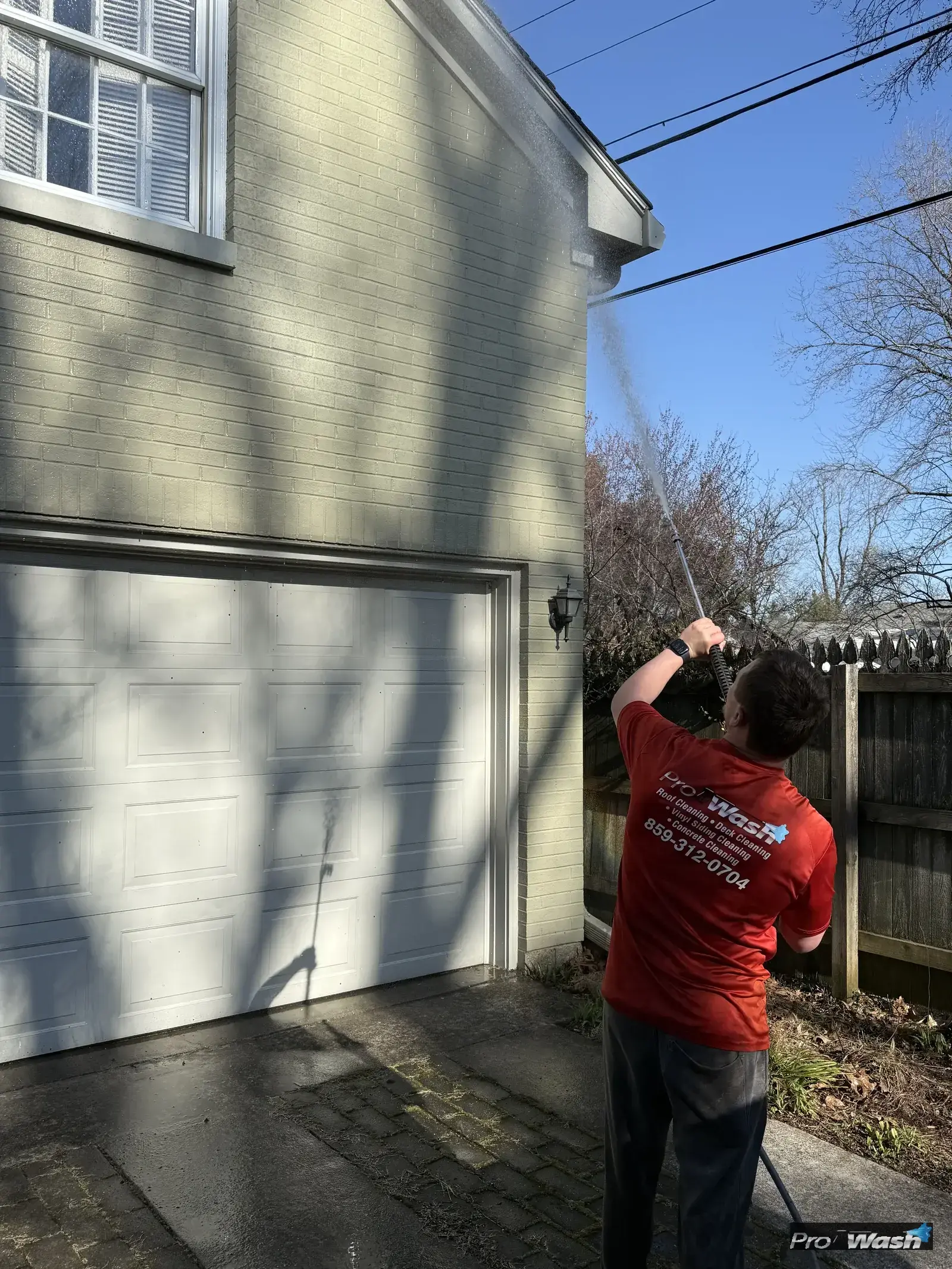 Inman ProWash soft washing siding on a Richmond home.