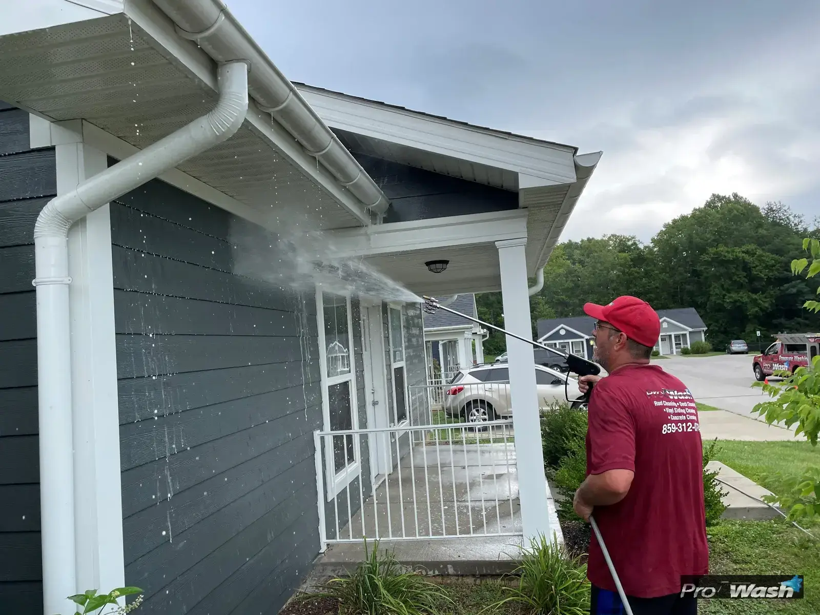 Soft washing the exterior of a Lexington apartment building.