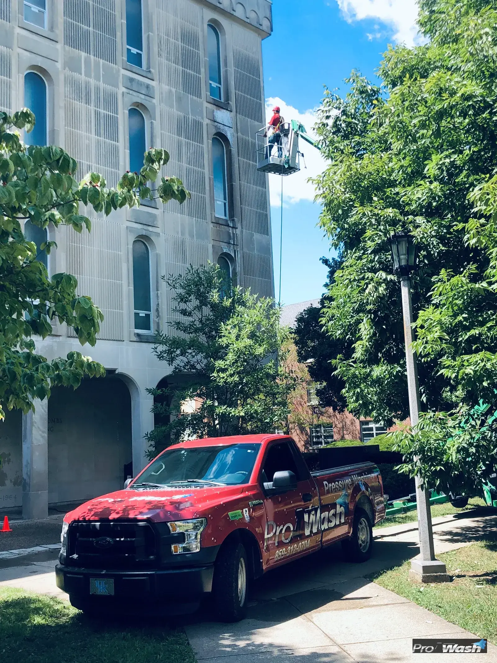 Commercial building exterior cleaning in progress in central Kentucky.