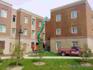 Pressure washing a large building in Richmond KY at EKU