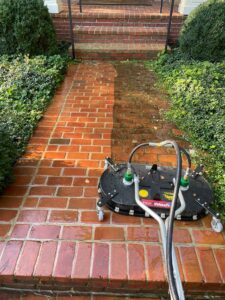 Surface cleaning brick sidewalk to remove grime and gum