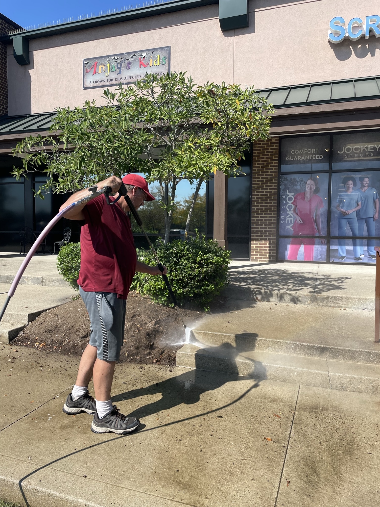 Commercial power washing strip mall